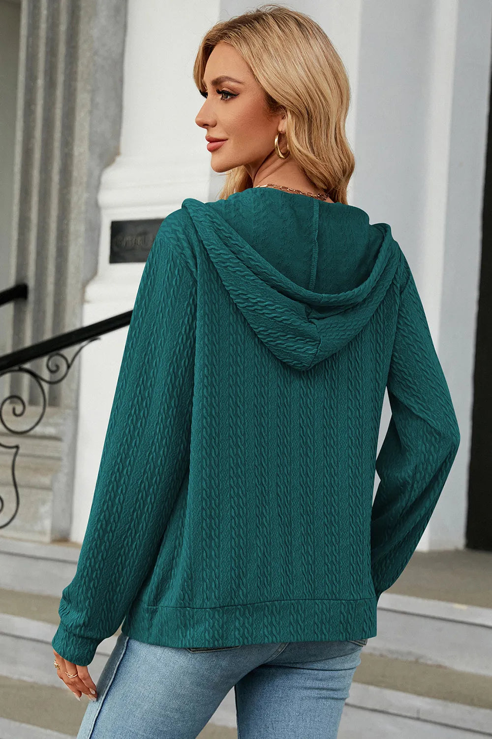 Turquoise drawstring zip-up hoodie, hooded back view with ribbed cuffs and hem