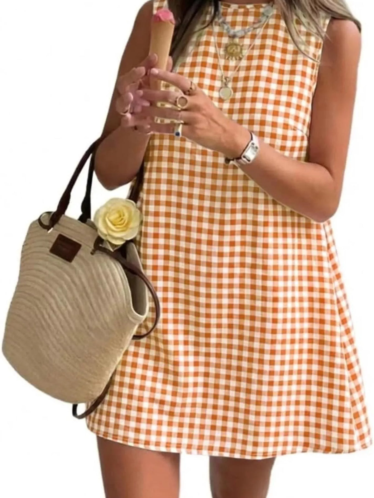 Orange and white gingham sleeveless A-line mini dress with round neckline