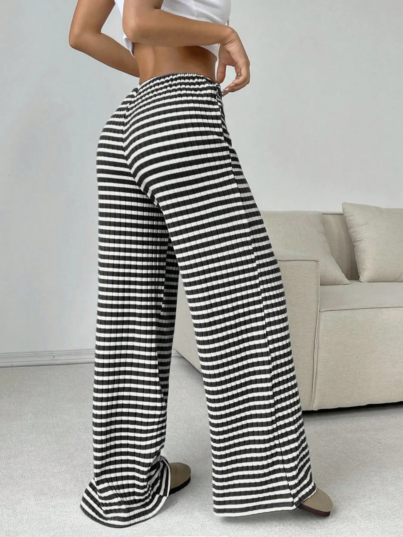 Striped wide-leg drawstring pants, black and white vertical stripes, full length