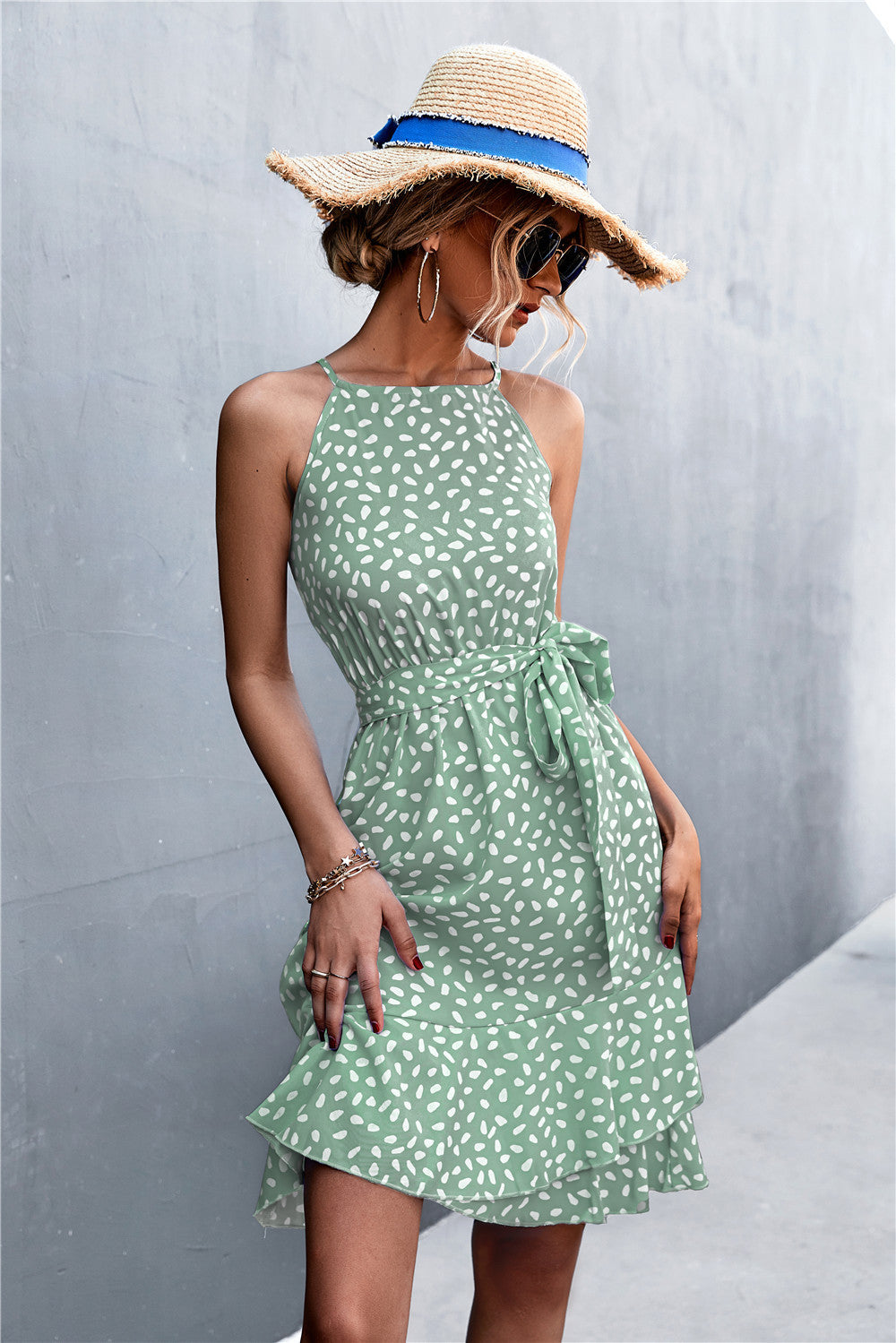 Gum leaf green tie-waist sleeveless dress with white speckle print and bow-tied waist