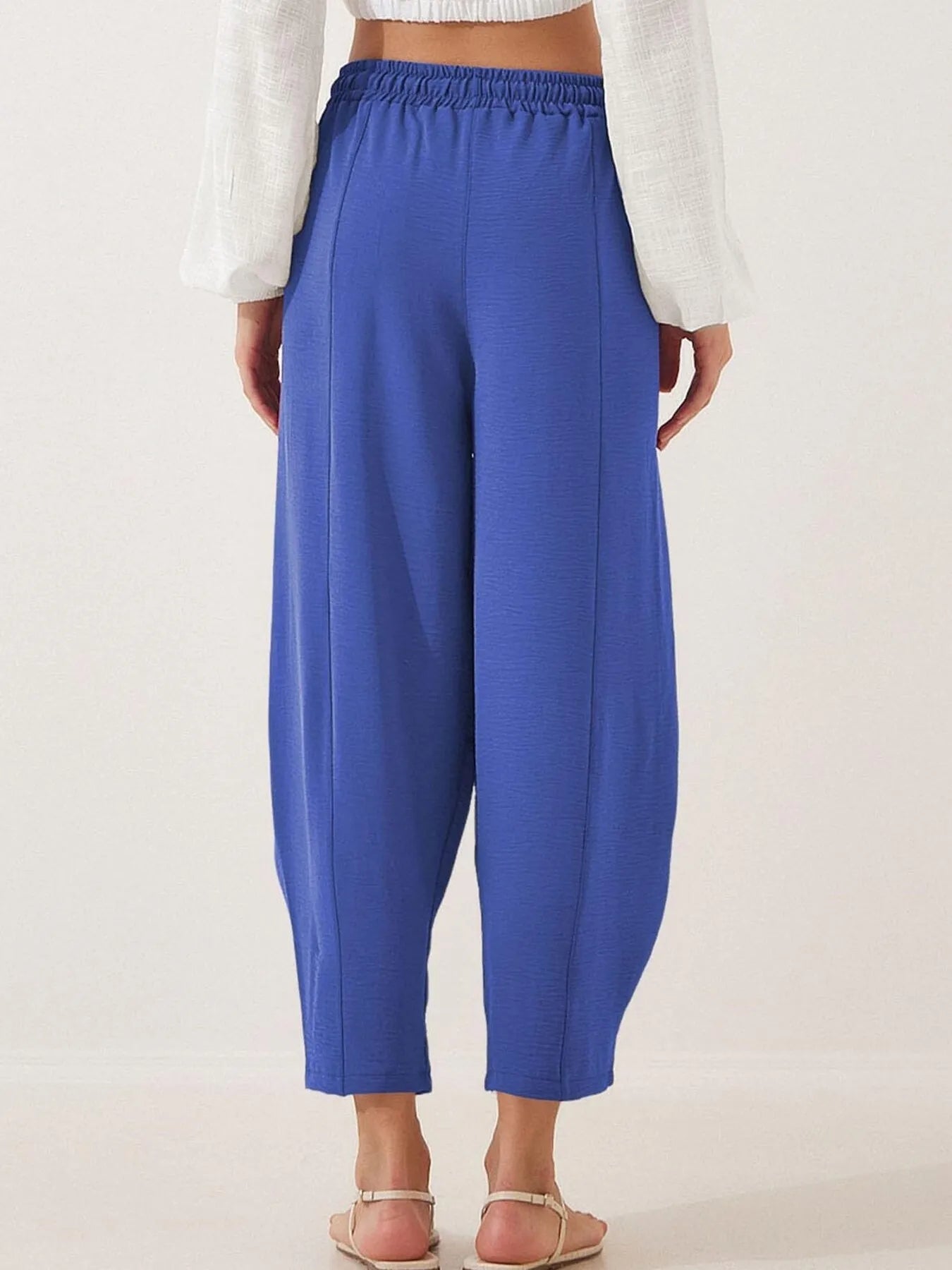 Royal blue drawstring wide-leg cropped pants with elastic waist, tapered cropped hem