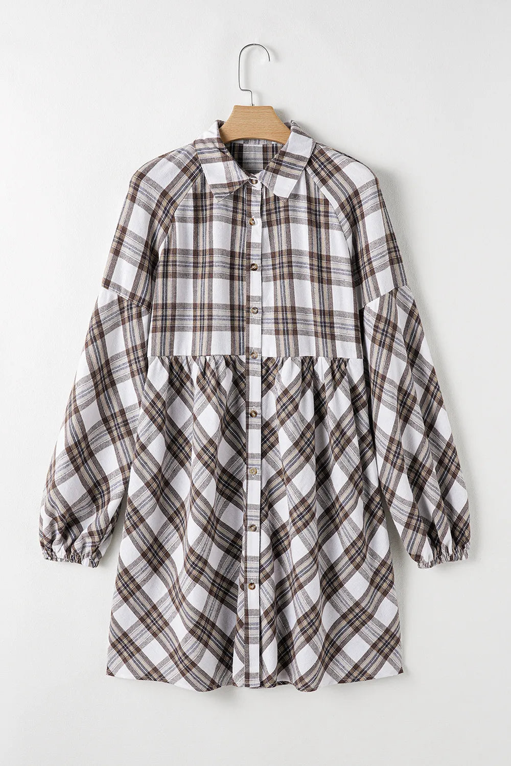 Plaid collared mini shirt dress on hanger with button front and balloon sleeves, white base