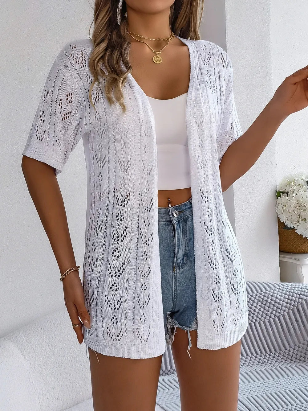 White openwork open-front half-sleeve cardigan, front view
