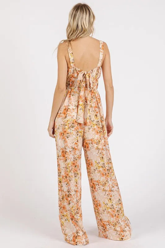 Back view peach floral sleeveless jumpsuit with gathered bust and open scoop back