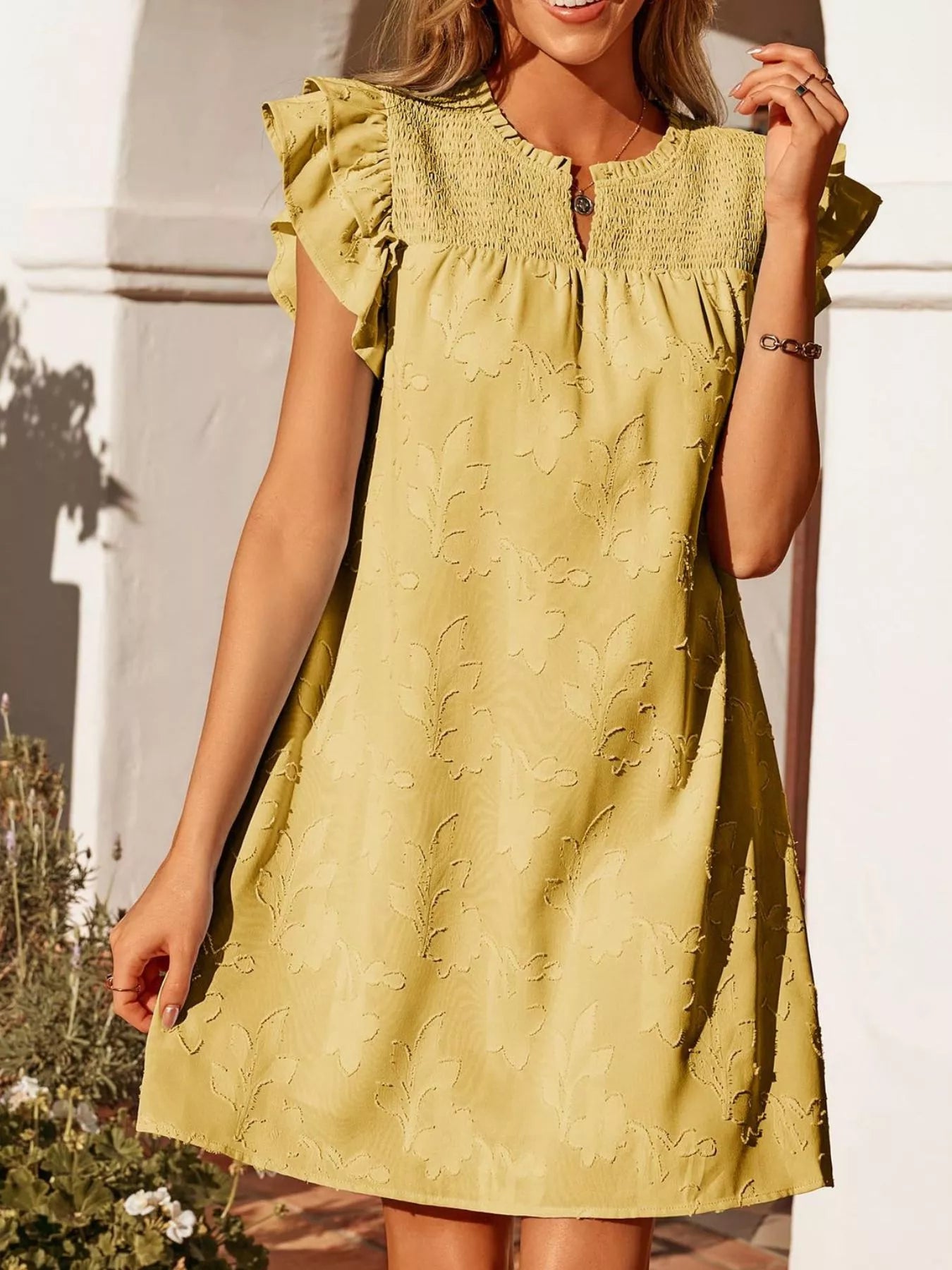 Floral Embossed Ruffle Sleeve Mini Dress in yellow with smocked bodice