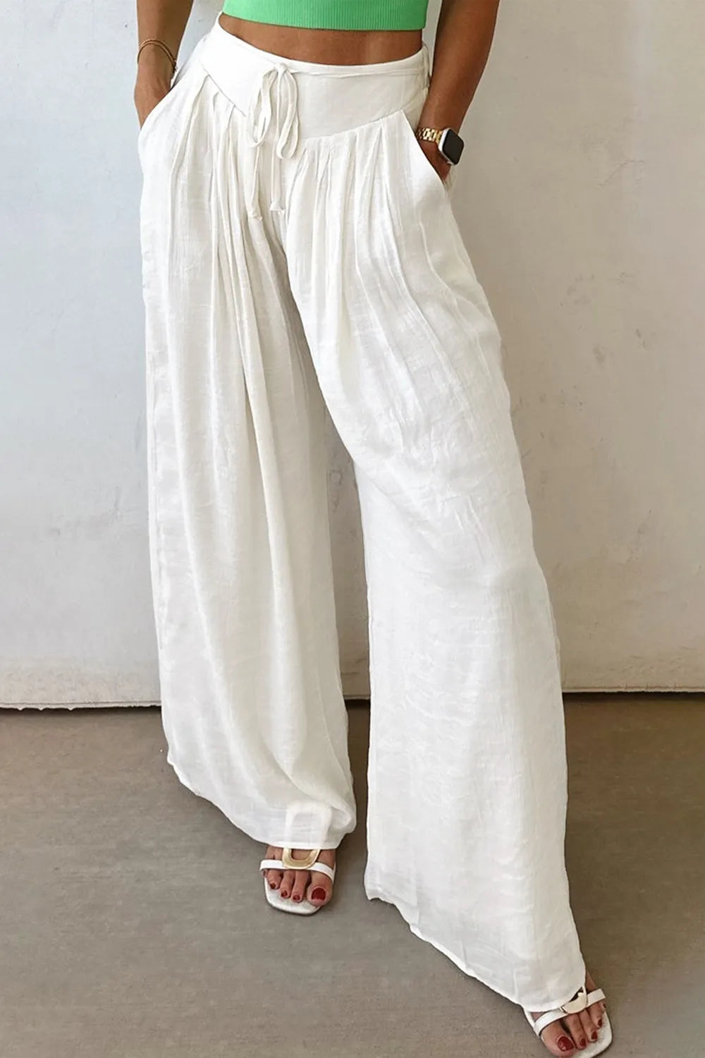 White wide-leg pants with drawstring elastic waist, flowy drape