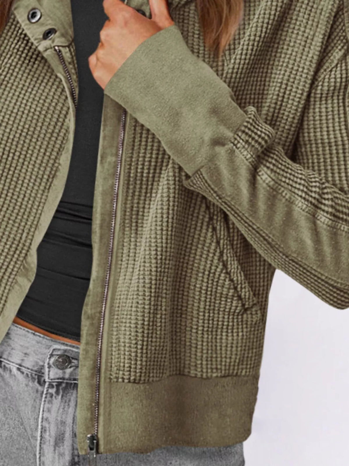 Army green waffle knit zip-up jacket with long sleeves and zip front