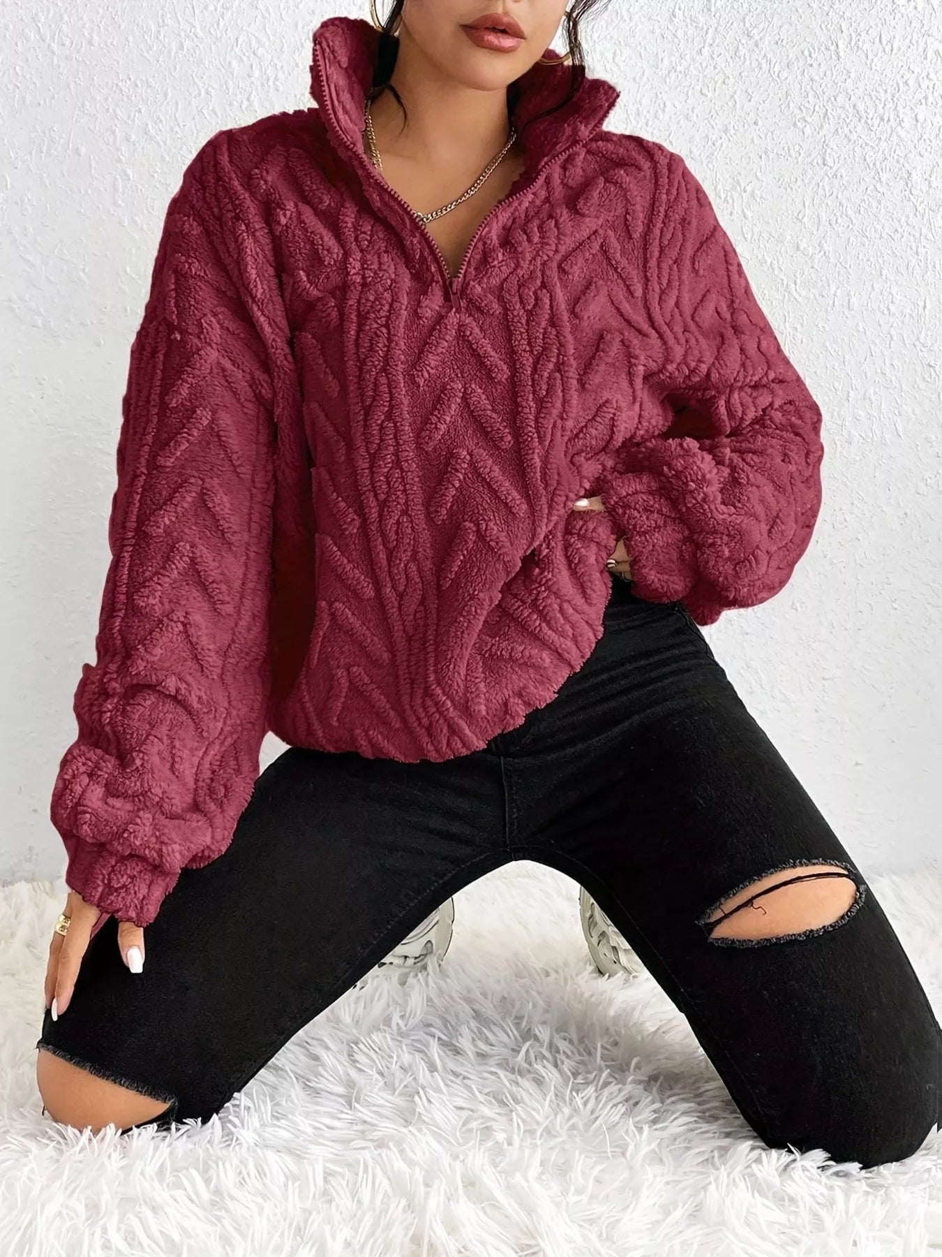 Sherpa quarter-zip sweatshirt, burgundy cable knit texture, relaxed fit