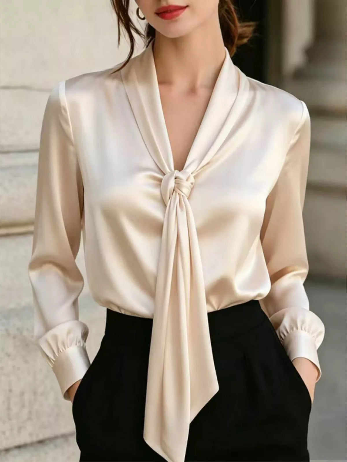 Ivory satin blouse with V-neck and front tie, long sleeves