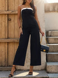 Black tube sleeveless wide-leg jumpsuit with white contrast neckline