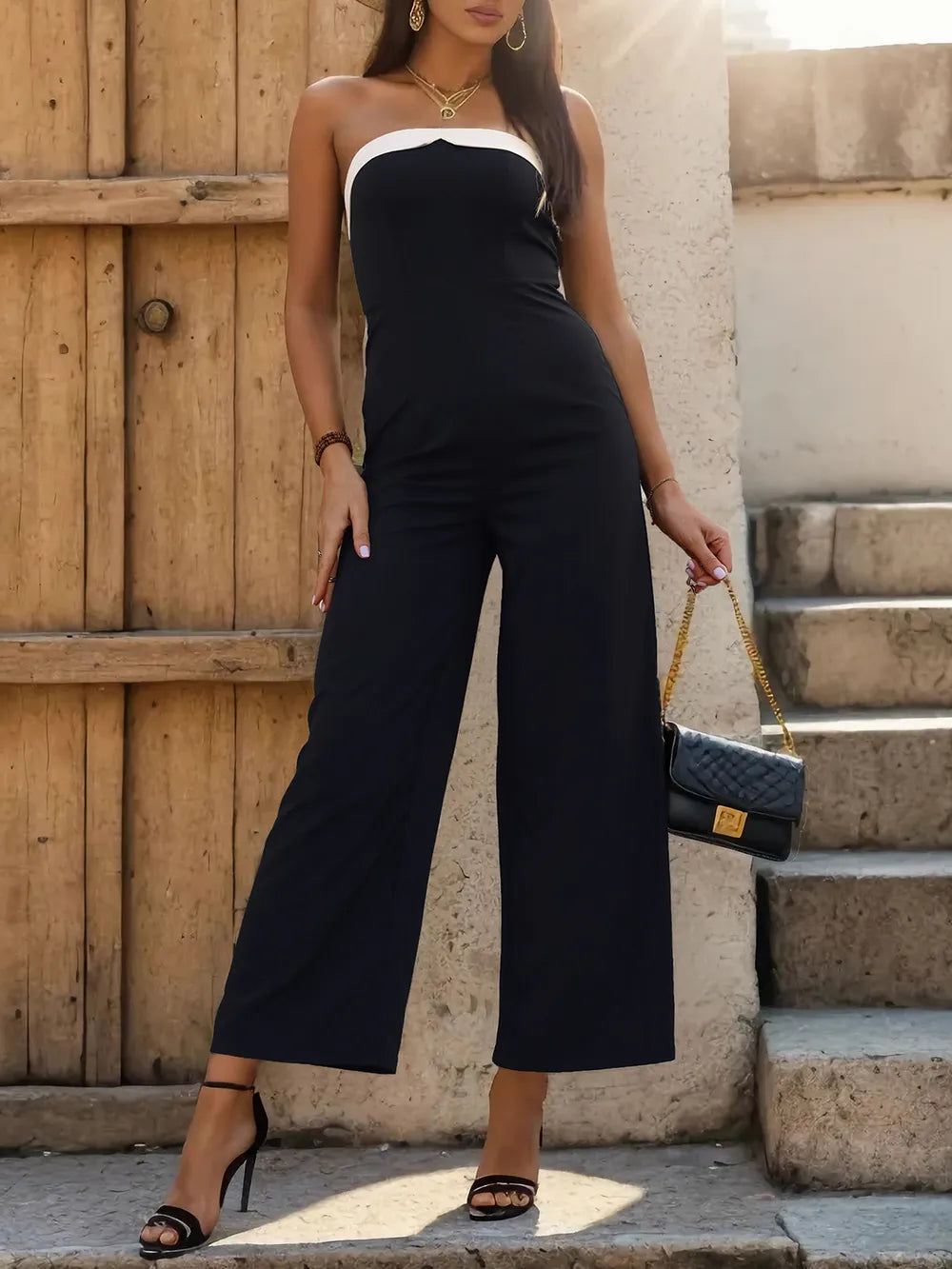 Black tube sleeveless wide-leg jumpsuit with white contrast neckline