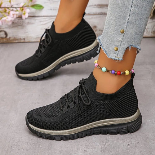 Black knit mesh lace-up athletic sneakers with thick tread sole