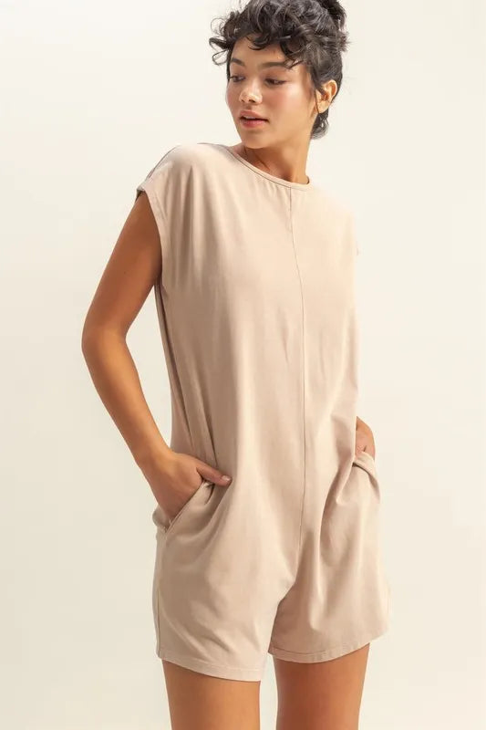Cedar & Moore HYFVE Round Neck Cap Sleeve Relaxed Fit Breezy Romper, beige with pockets.