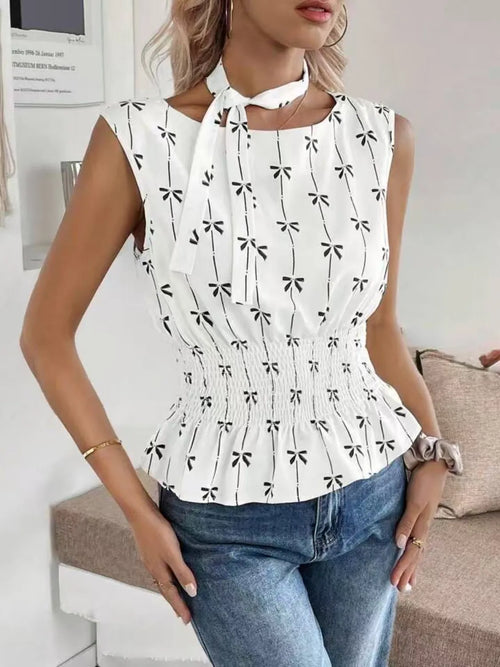 White bow print tie-shoulder tank top with bow-tie straps and gathered waist peplum