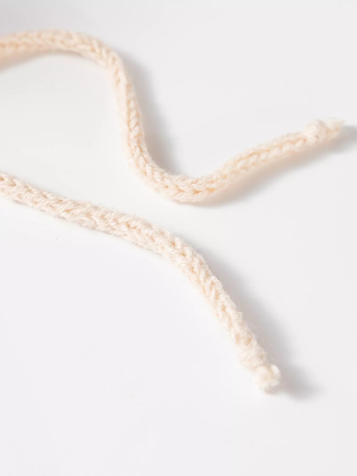 Hooded knit sweater with contrast trim and drawstring ends, light beige