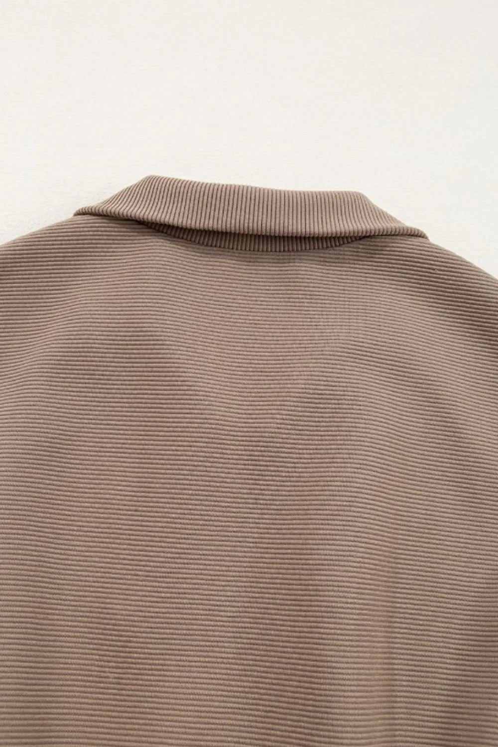 Mocha textured romper back with wide ribbed collar and striped knit