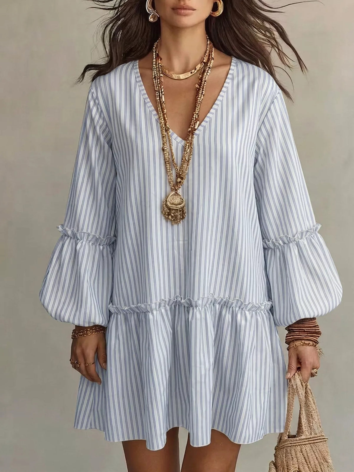 Light blue striped V-neck mini dress with balloon sleeves and gathered skirt