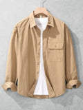 Khaki button-up long sleeve shirt with chest pocket, button front, and spread collar.