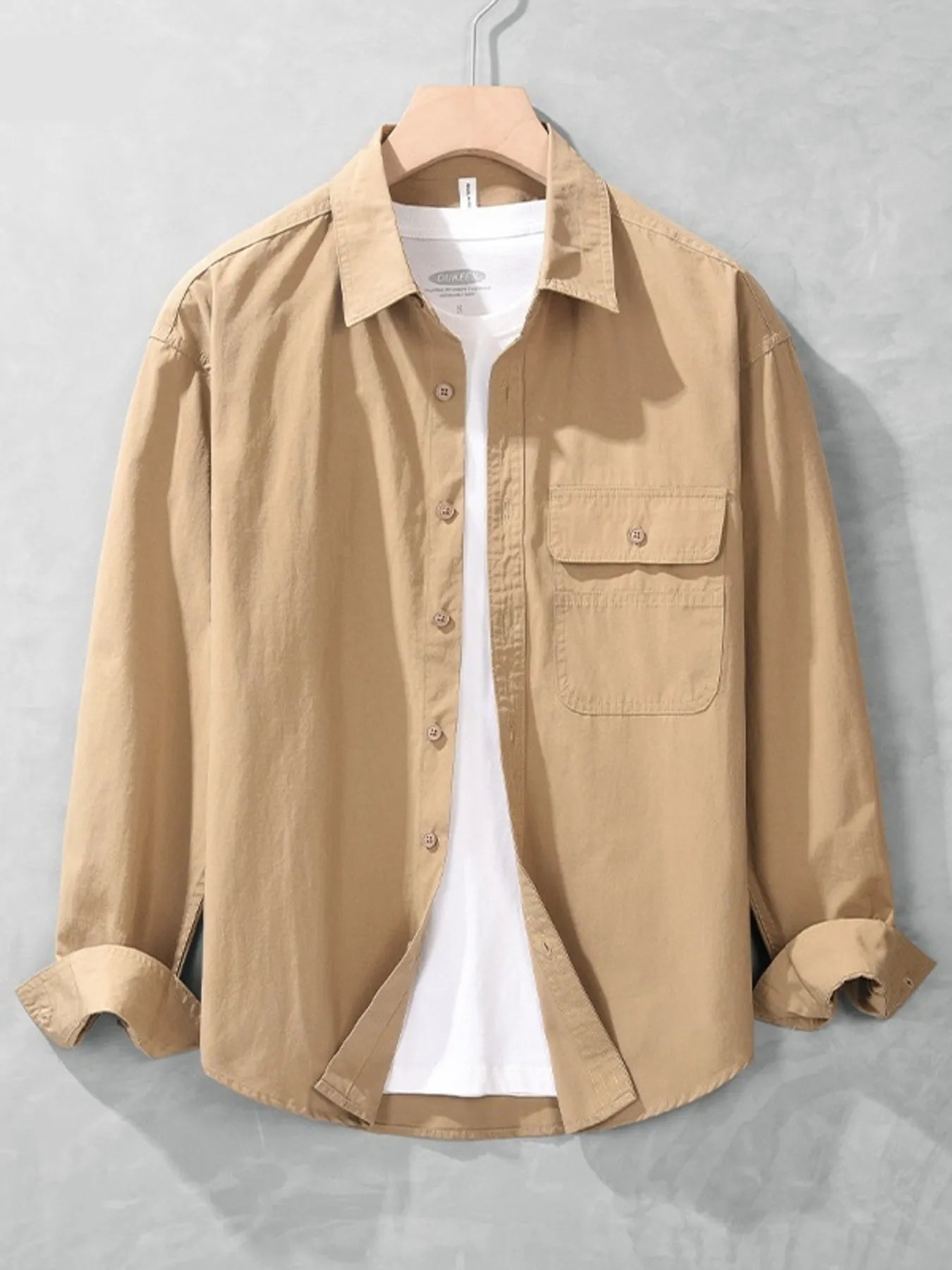 Khaki button-up long sleeve shirt with chest pocket, button front, and spread collar.