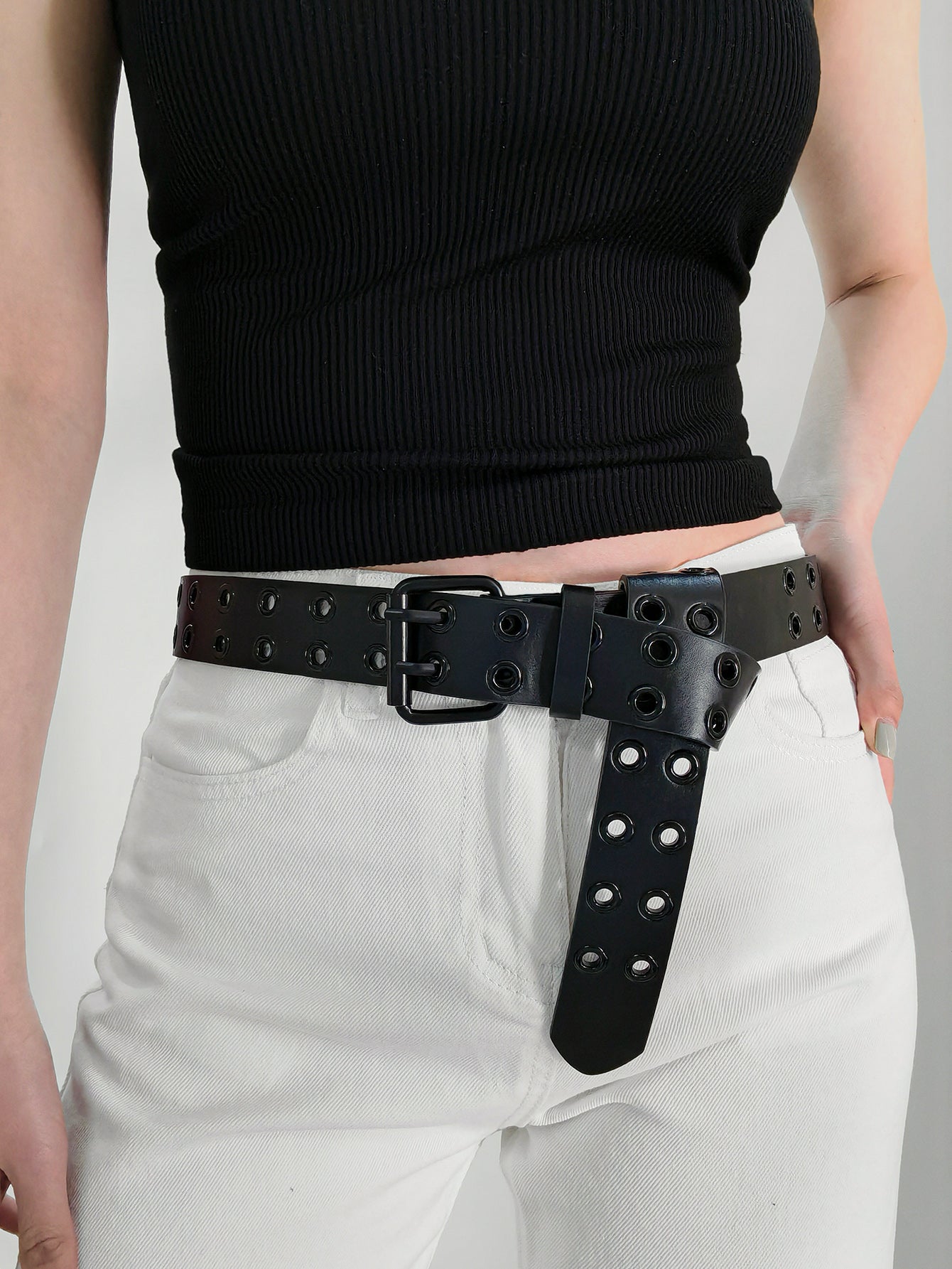 Black vegan leather grommet belt with square buckle and decorative eyelets