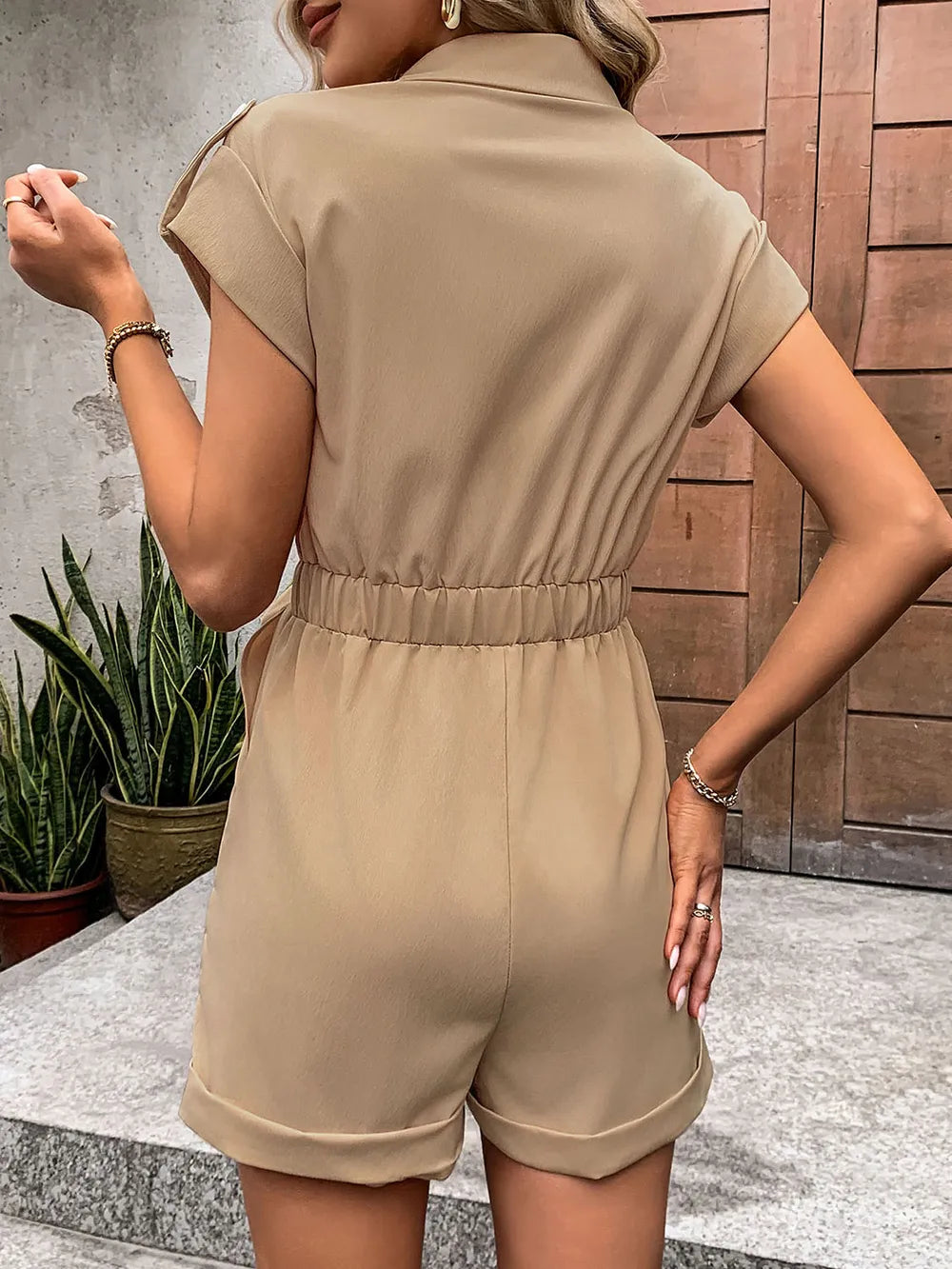 Camel collared romper with gathered waist and short sleeves, back view