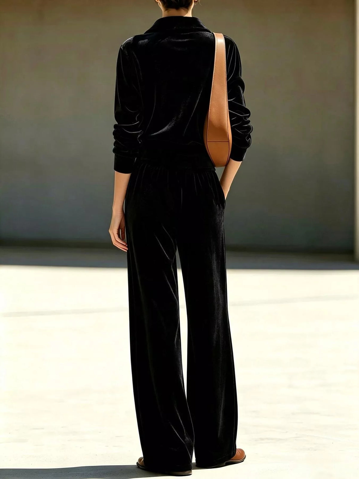 Black half-zip sweatshirt and wide-leg pants set, back view