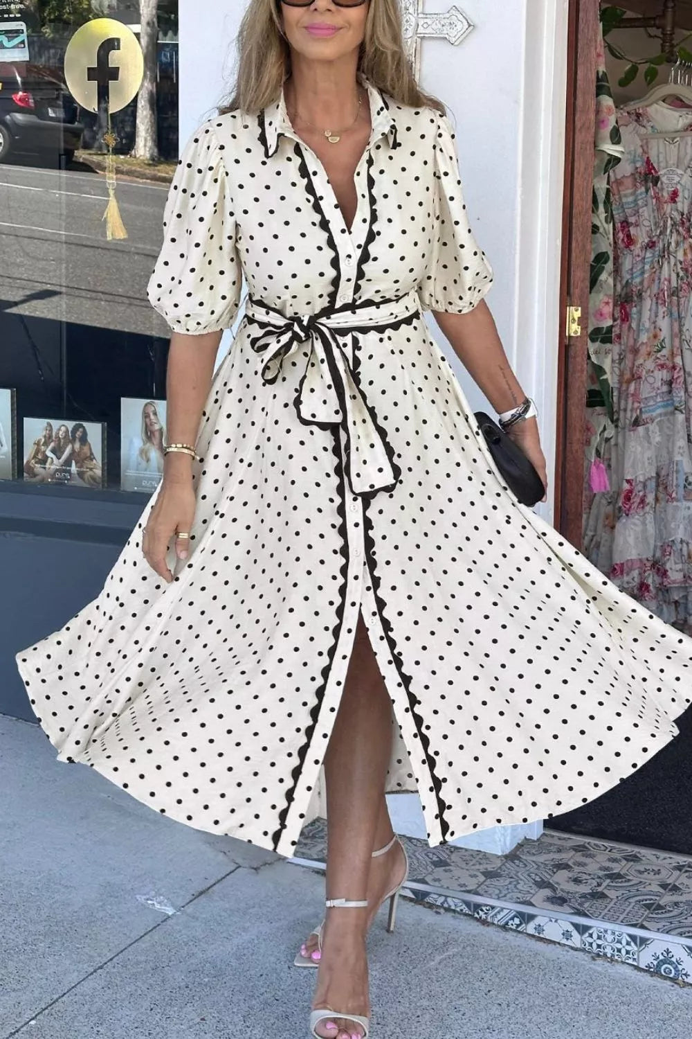 Cedar & Moore Polka Dot Half-Sleeve Midi Dress, belted with button-front detail in white with black dots.