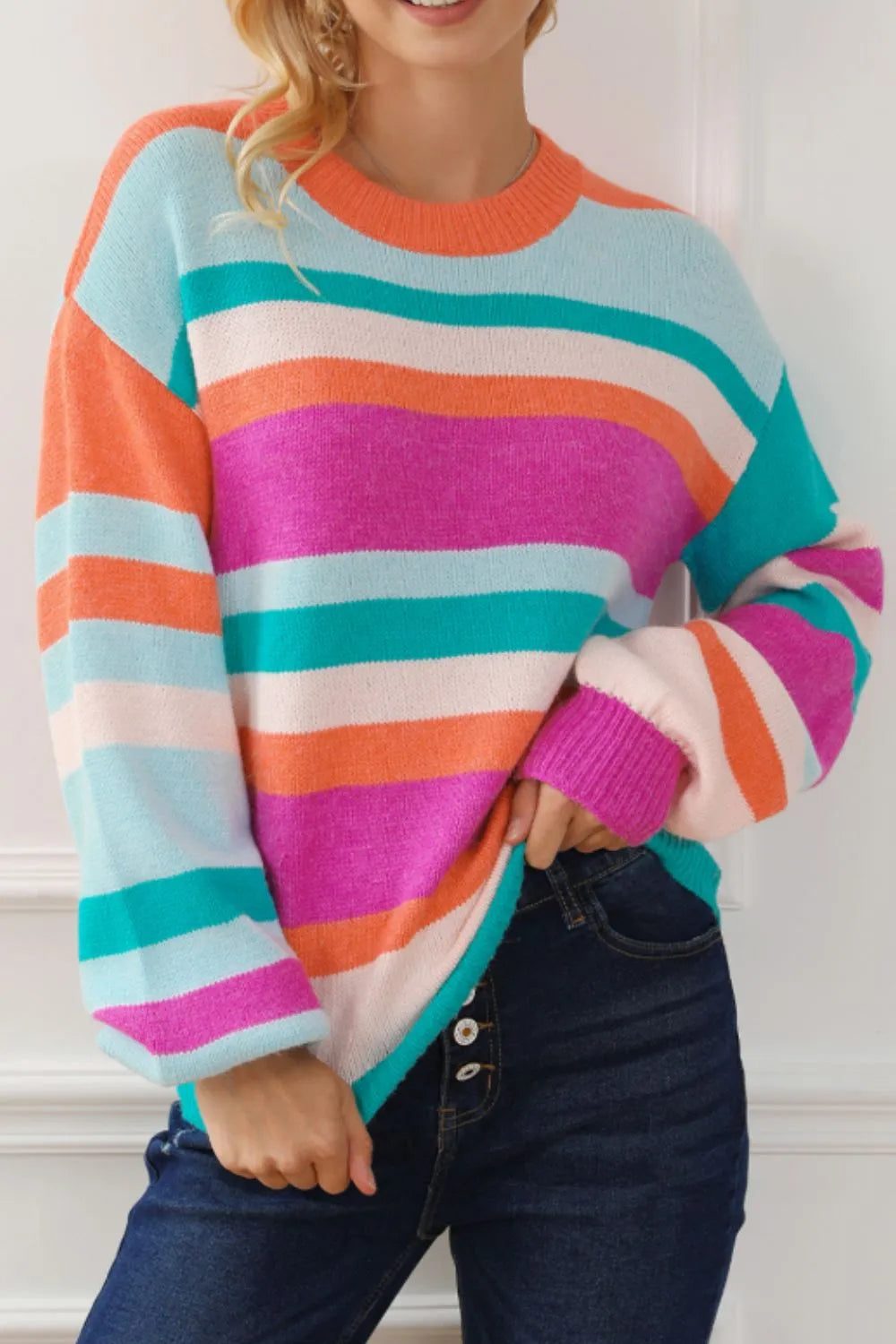 Striped round-neck drop-shoulder sweater in multicolor with long sleeves and ribbed cuffs.