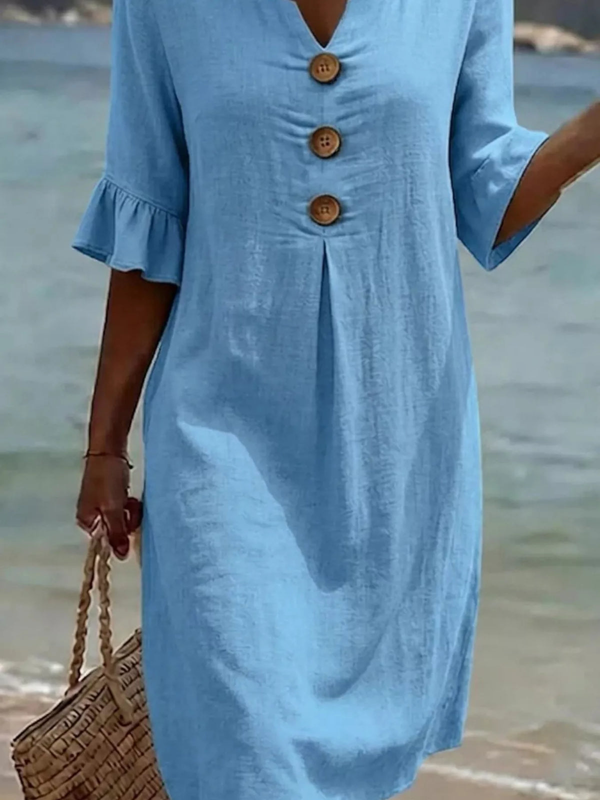 Sky blue button-front dress with ruffle half sleeves and gathered front