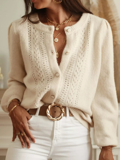 Ivory button-up long-sleeve knit cardigan with button front and textured yoke