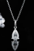 Sterling silver necklace with pear-shaped moissanite pendant and link chain