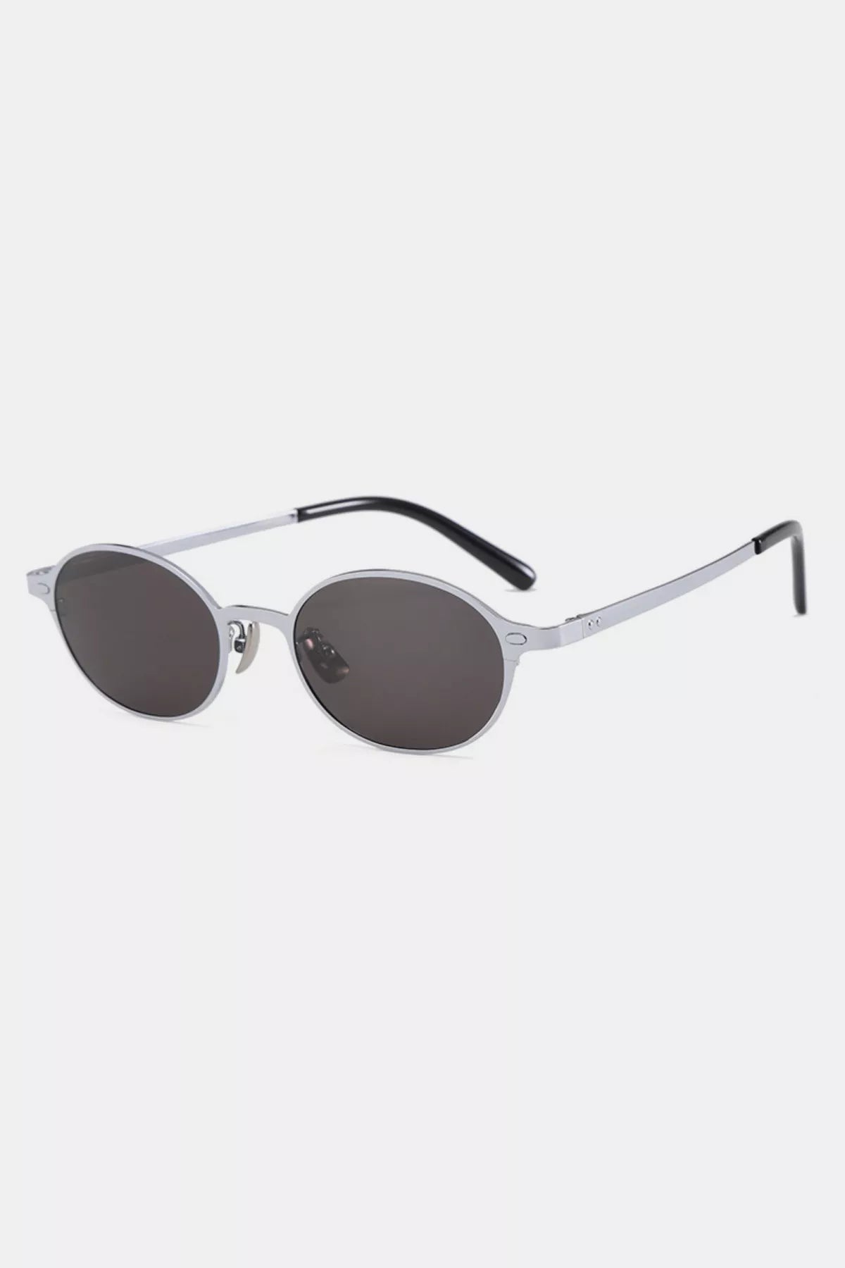 Cedar & Moore Vintage oval sunglasses by Trendsi with silver metal frame and dark gray lenses