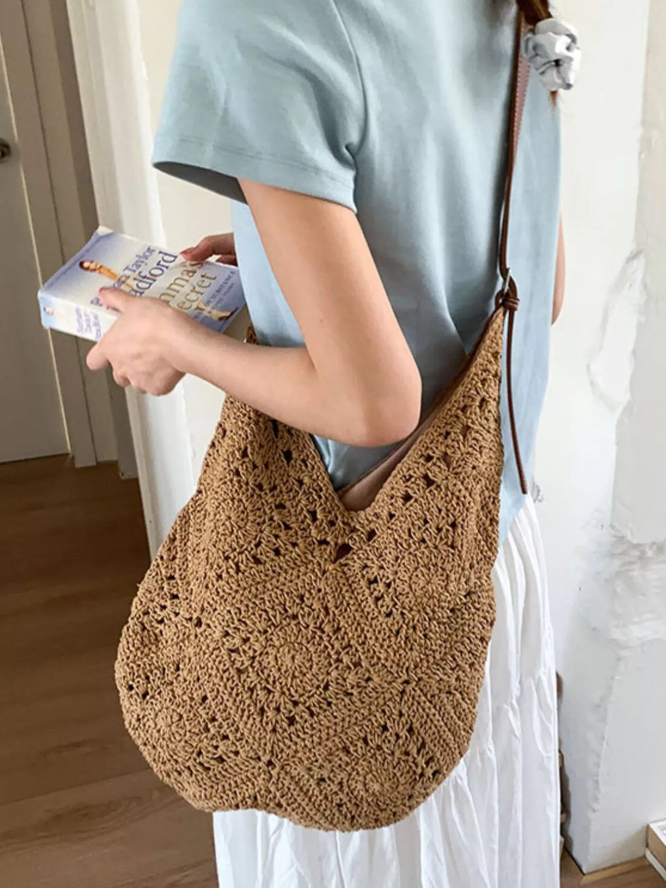Camel crochet slouchy shoulder bag with brown leather strap and textured knit body