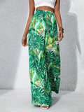 Printed high-waist wide-leg pants, green palm leaf print, gathered elastic waist