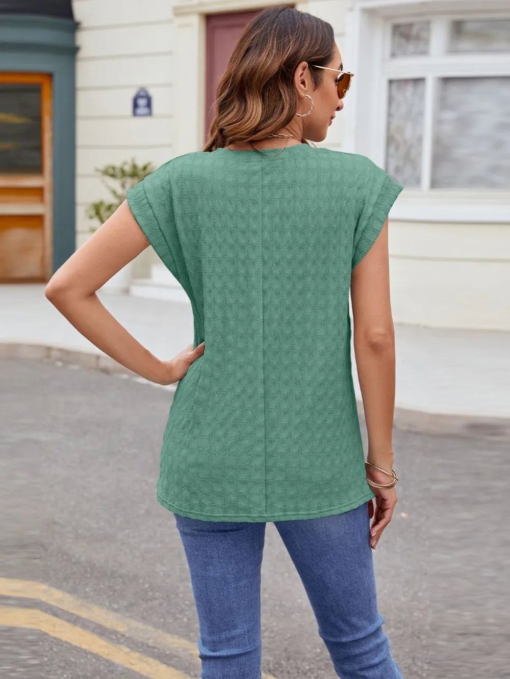 Green textured round-neck cap-sleeve T-shirt, back view with short sleeves