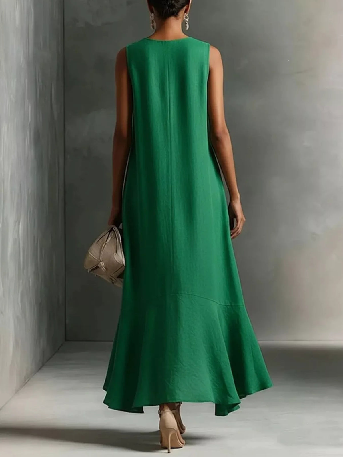 Green sleeveless summer dress with V-neck back and ruffled high-low hem