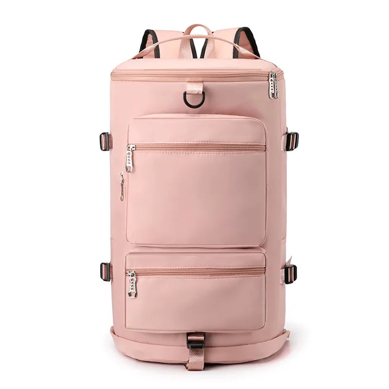 Large travel backpack with two front zip pockets and top handle, pale pink