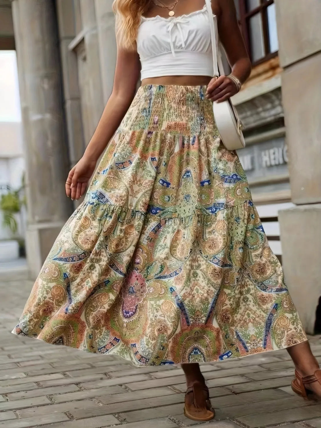 High-waist smocked printed skirt, cream with blue and pink paisley; flowy midi