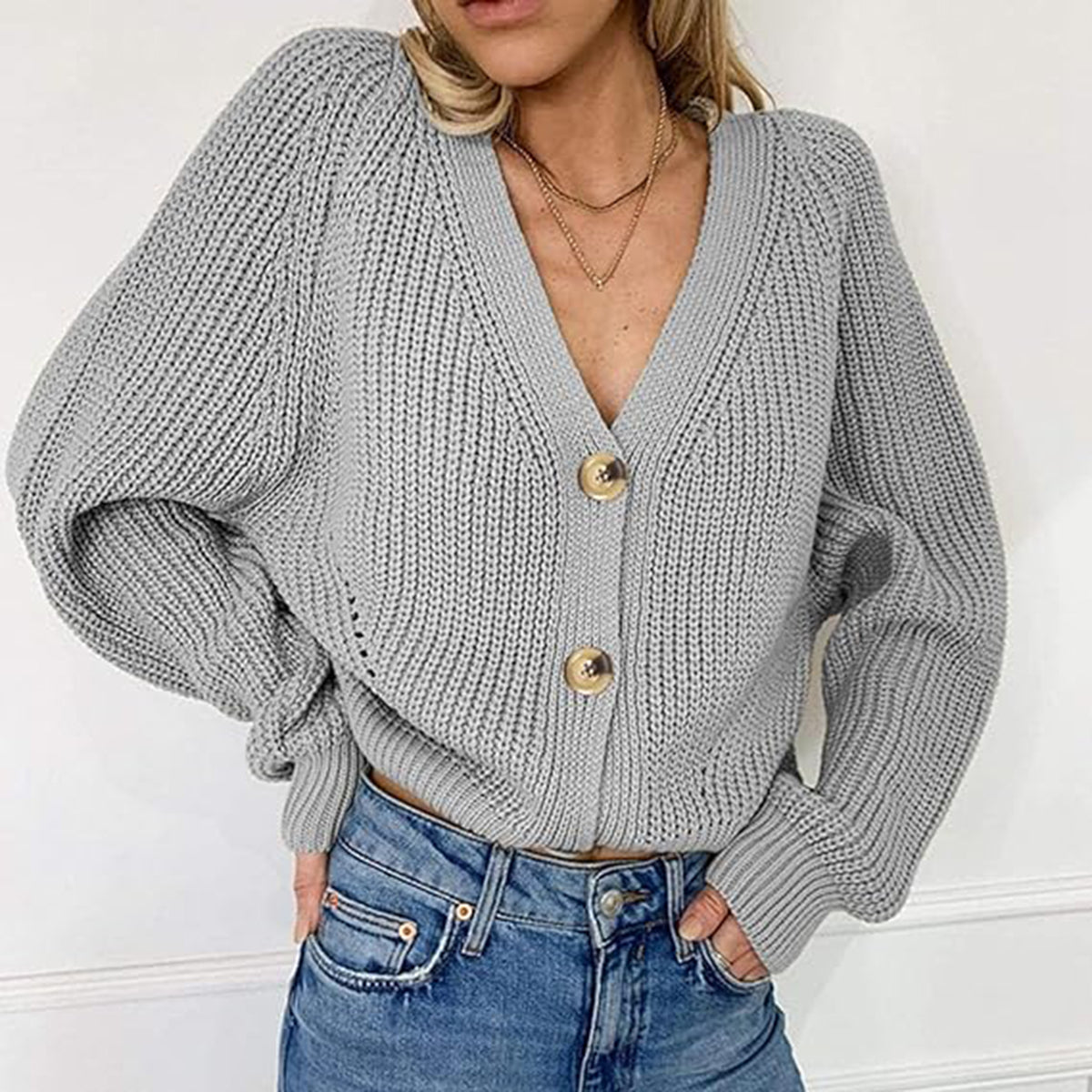 Gray V-neck button-front long sleeve cardigan with chunky knit texture