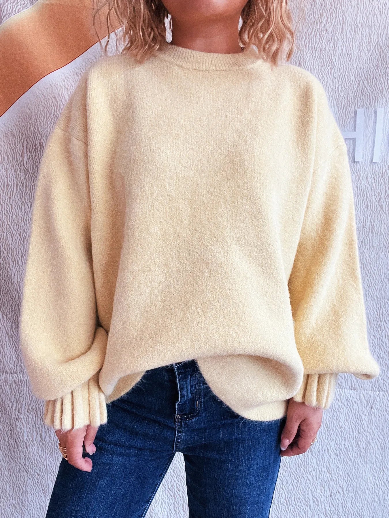 Cream round neck dropped-shoulder sweater with ribbed cuffs and dropped sleeves