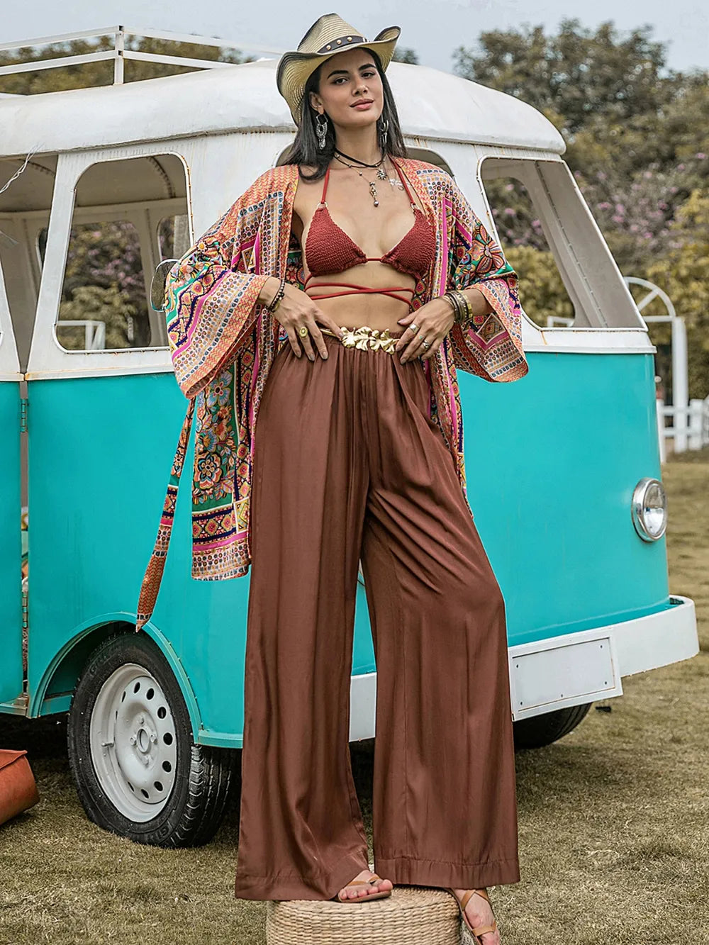 Brown wide-leg pants with high elastic waist and relaxed fit, straight wide legs