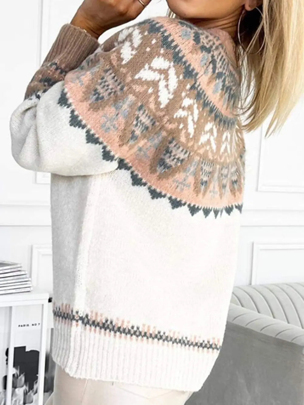 Ivory knit sweater with geometric yoke motif and patterned long sleeves