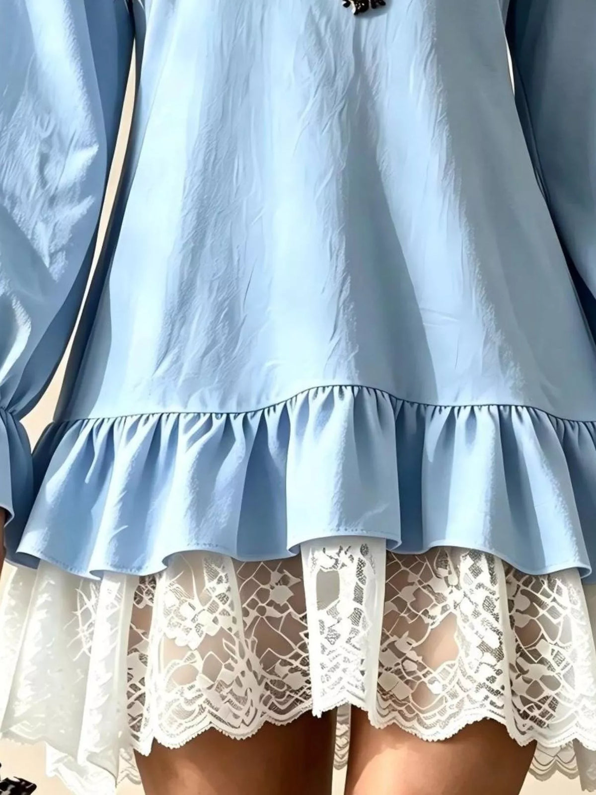 Light blue long-sleeve mini dress with ruffle hem and white lace trim
