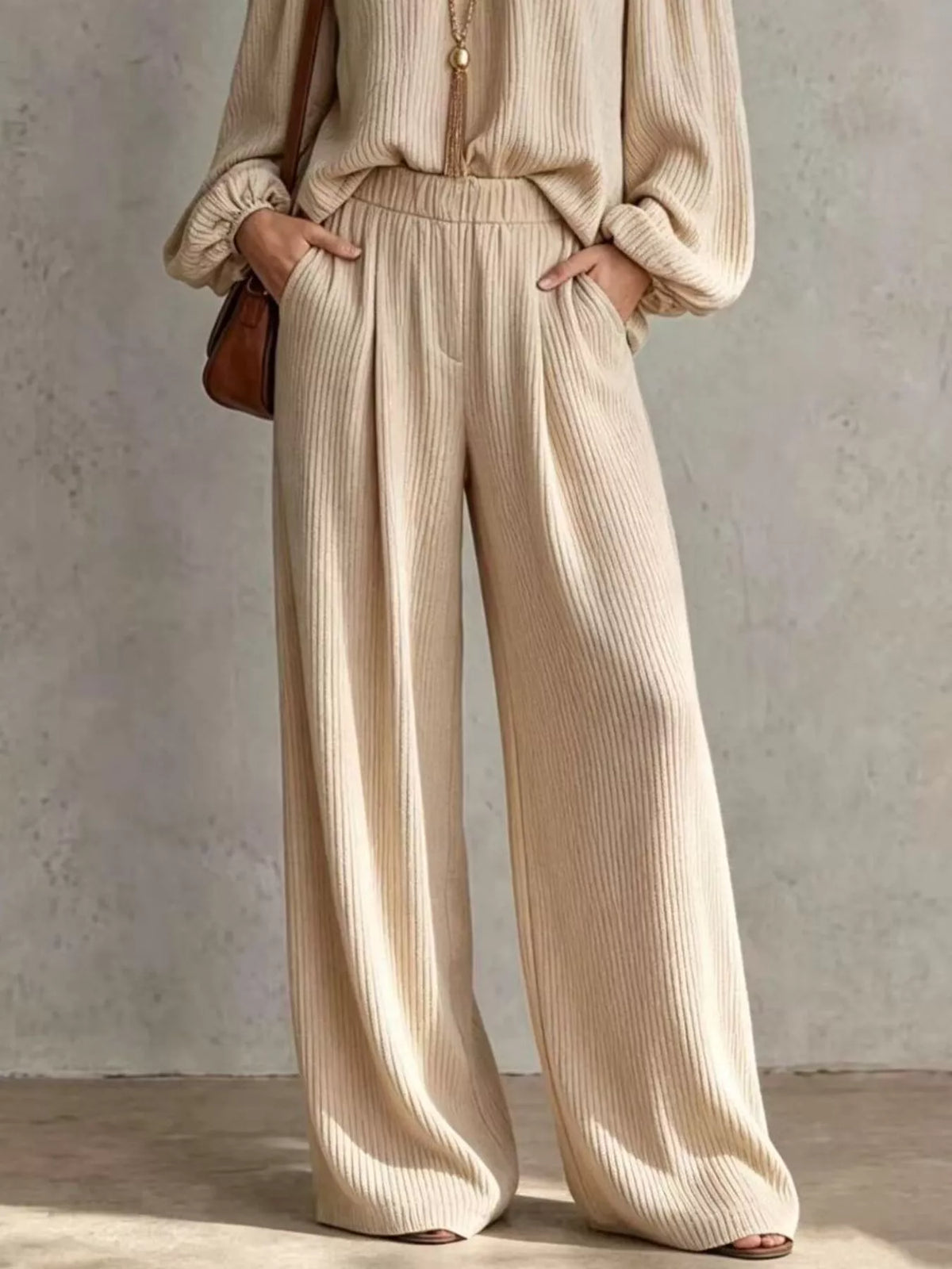 Beige ribbed wide-leg pants set with elastic waistband and flowing drape