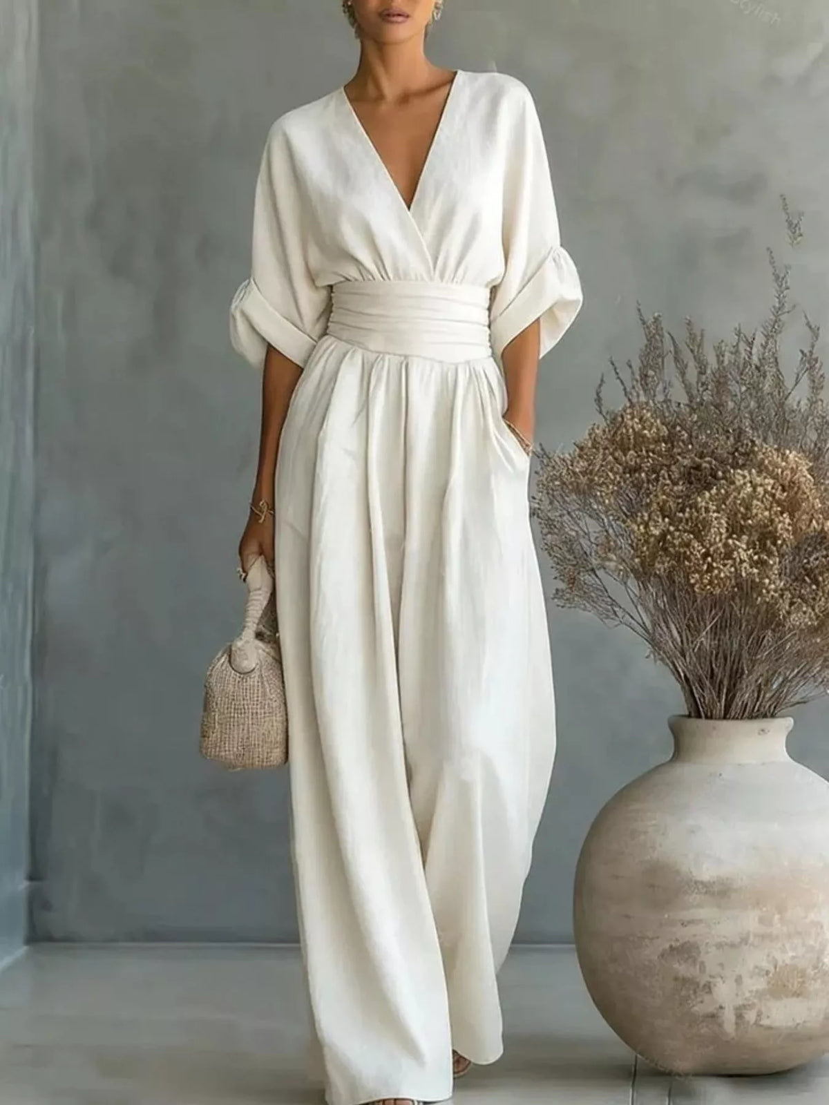 White ruched-waist wide-leg jumpsuit with V-neck and half sleeves