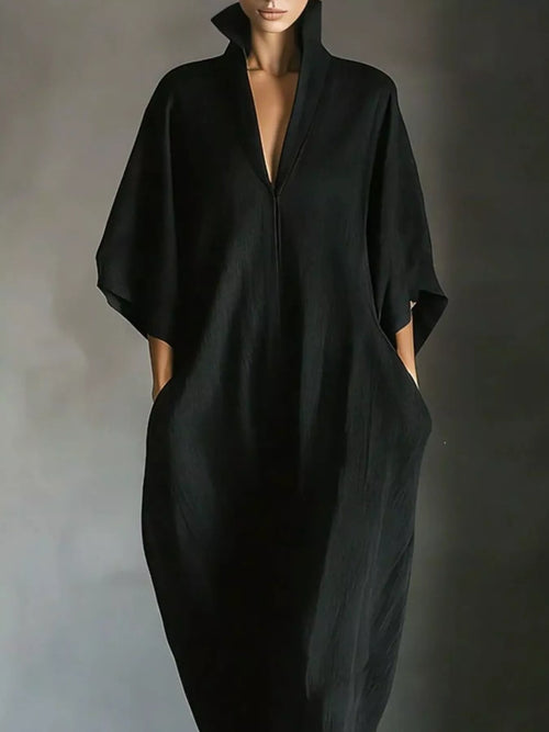 Black V-neck maxi dress with wide 3/4 sleeves and relaxed drape