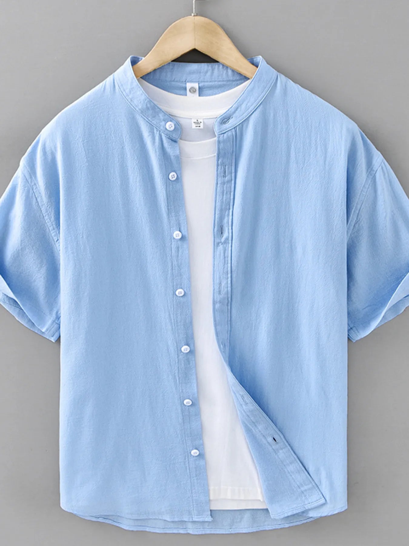Sky blue plus size button-up short sleeve shirt with button front placket