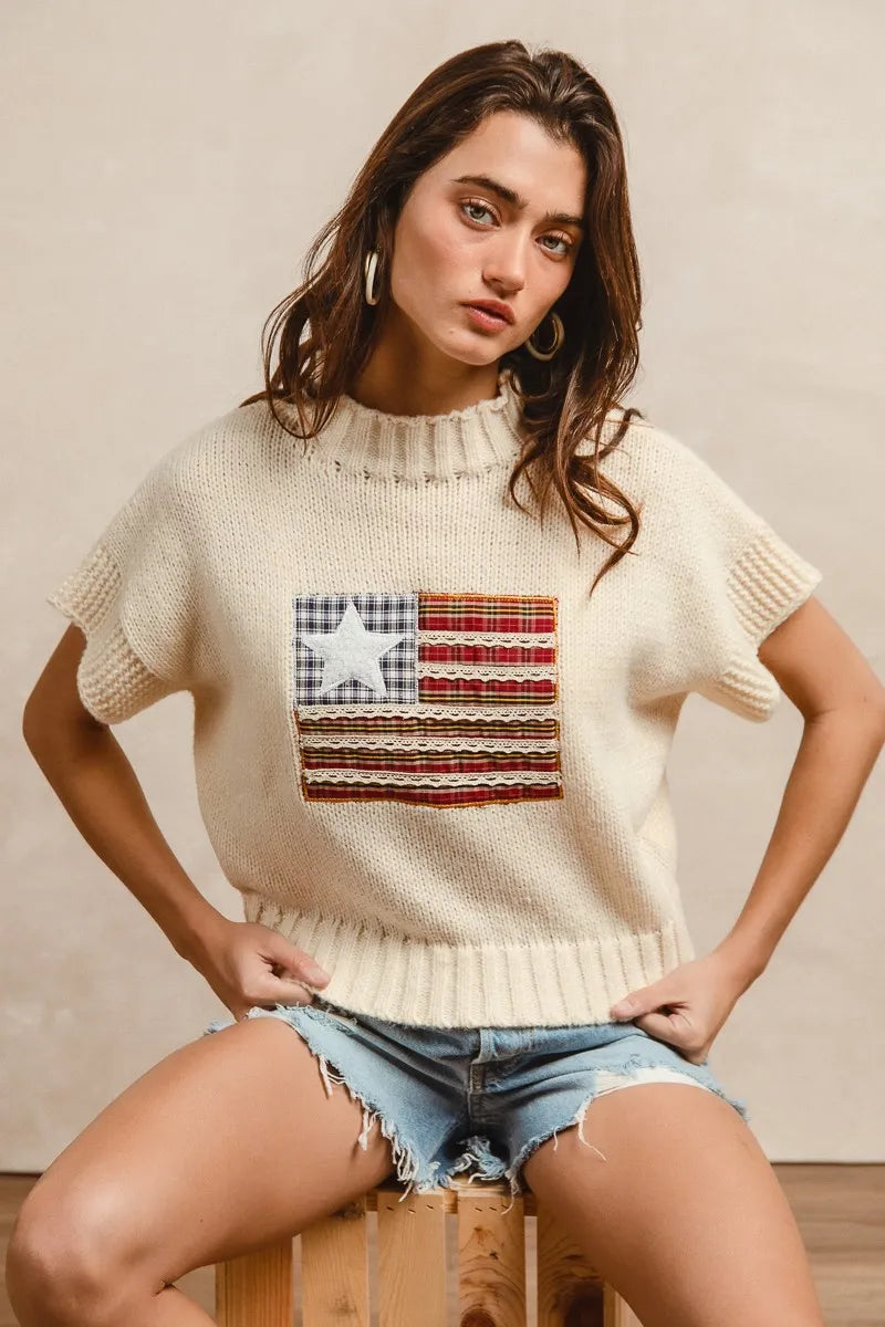 Oatmeal drop-shoulder sweater with short sleeves and American flag patch detail on front