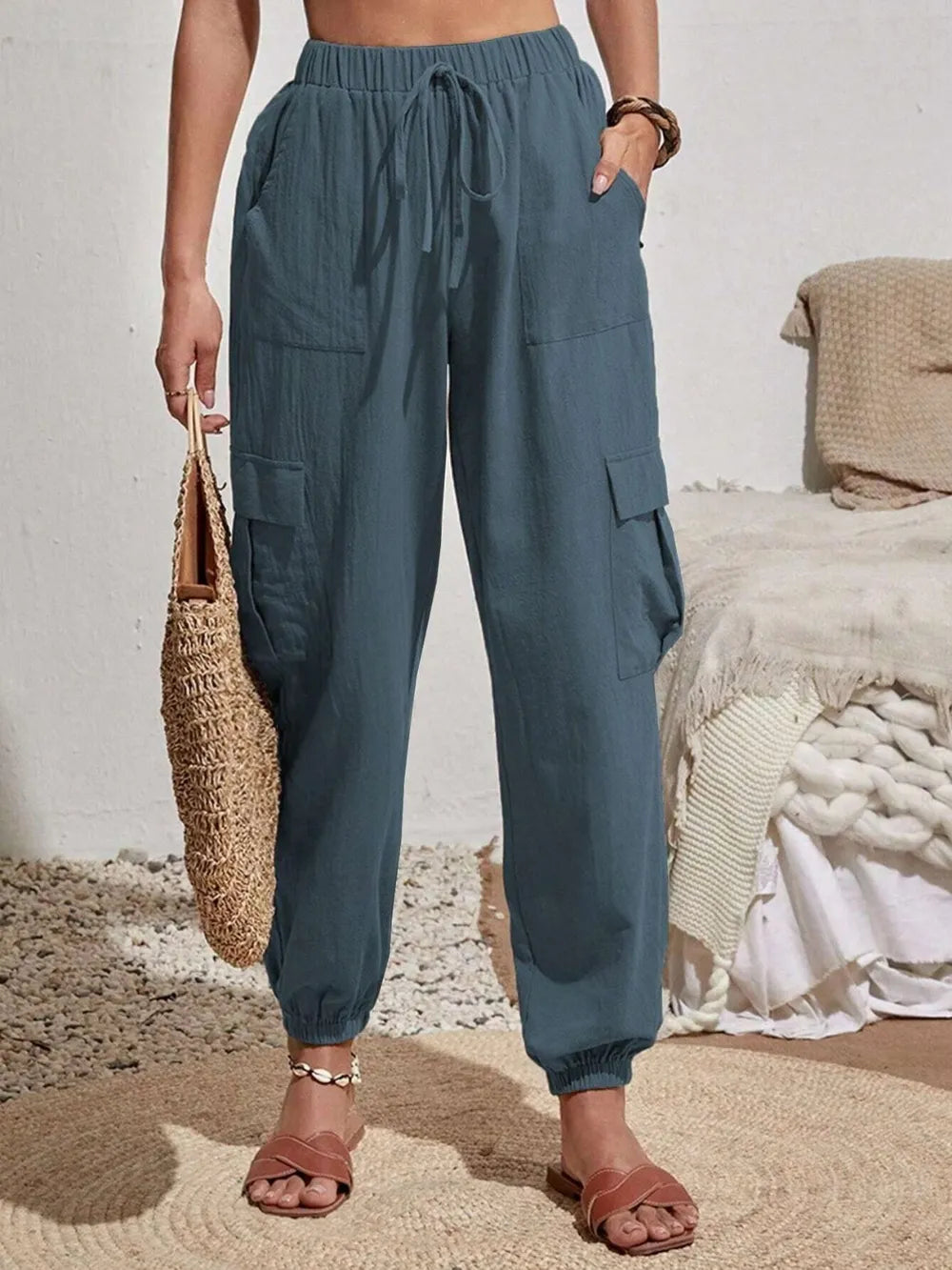 Drawstring cargo joggers in dusty blue, drawstring waist, elastic cuffs, side pockets