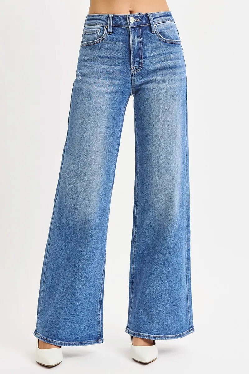 Medium wash high-rise wide-leg jeans with front fly and belt loops